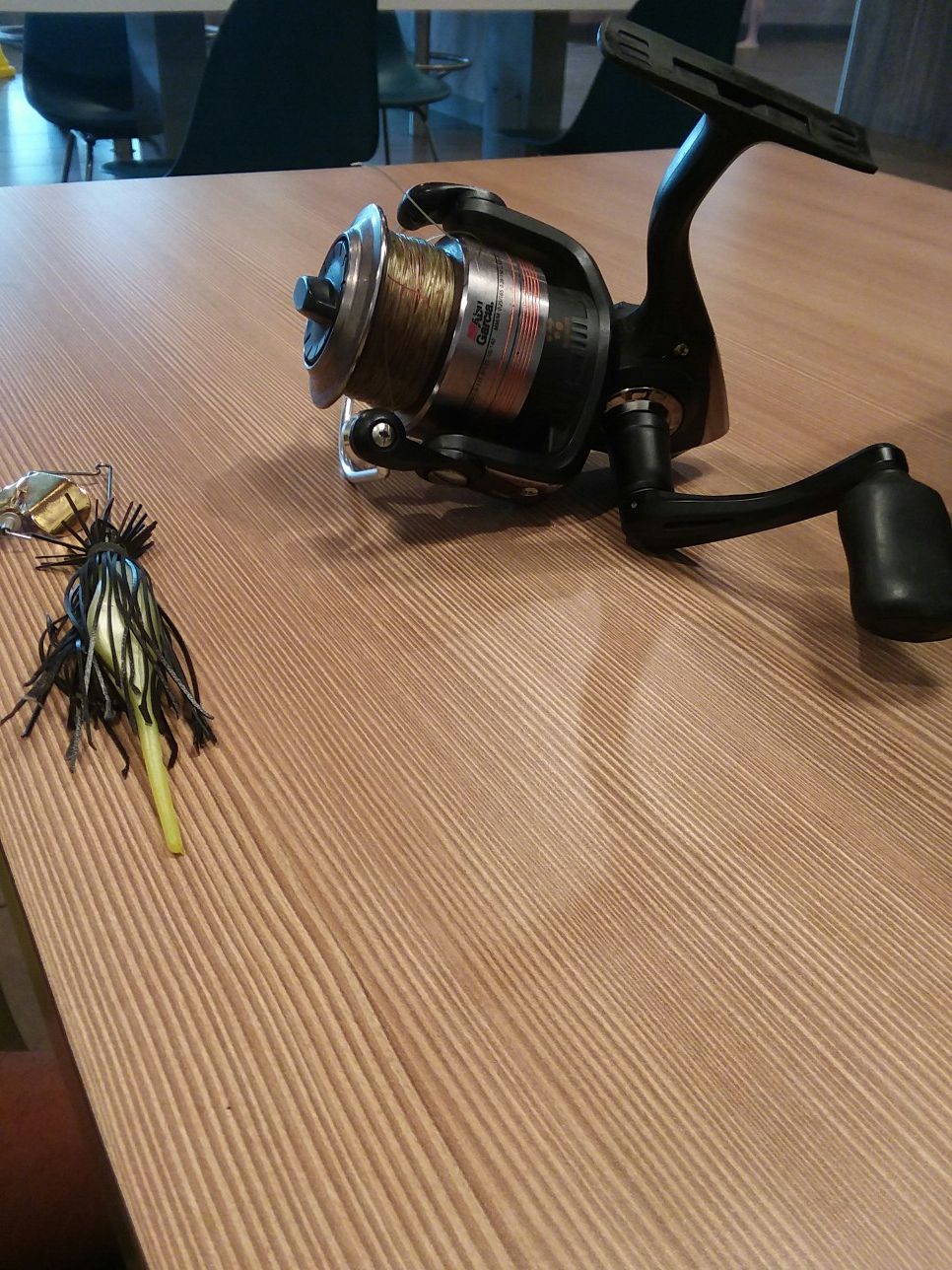 Black bass fishing buzzbait with Abu Garcia reel