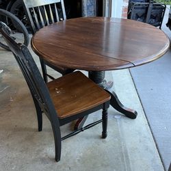 Round Pedestal Table with Two Chairs