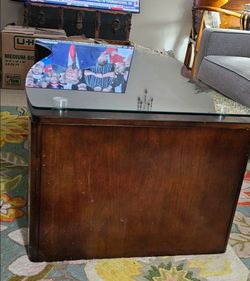 Glass wood table with underneath storage