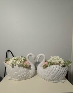 White ceramic swans 🦢 from Hobby Lobby