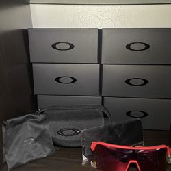 Red reflective Oakley sun glasses