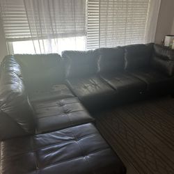 Black faux leather couch