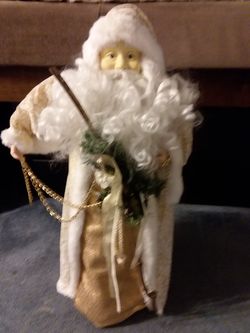 28 inches high by 16 inches wide santa