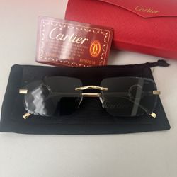 Cartier Sunglasses Black and gold