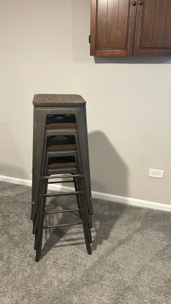 4 Metal bar stools with wood seats