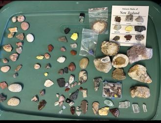 assortment of rocks, geodes, crystals, arrowheads