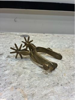 Spurs (brass)