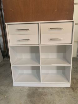 Bookcase with drawers.