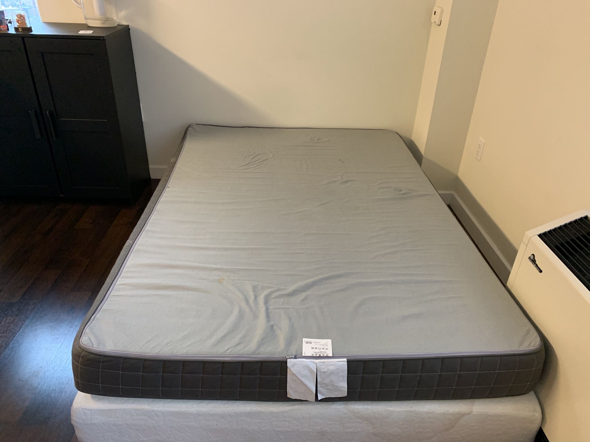 IKEA twin size bed with bed cover