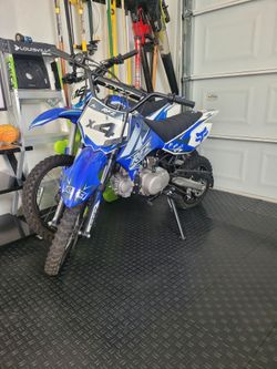2 dirt bikes
