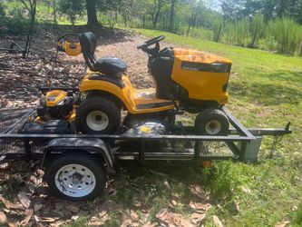 Riding lawn mower, push mower and trailer bundle deal