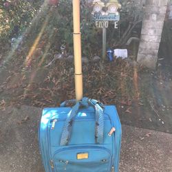 Nicole Miller New York Designer Rolling Handled Carry-On Luggage Bag