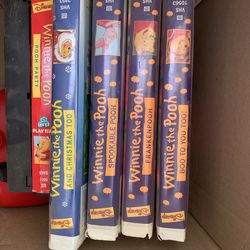 A lot of Winnie the Pooh movies $5 each or $20 all