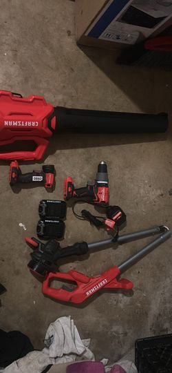 Craftsman combo drill, trimmer, blower light two batteries, and charger included