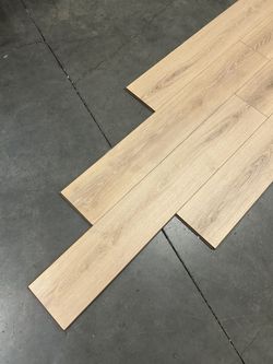 1.69/SF Laminate Flooring Oak Pad Attached