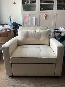 Sofa chair that retracts into a bed barely used