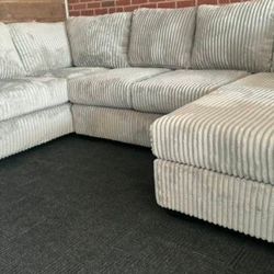 Brand new sectional and dining room set