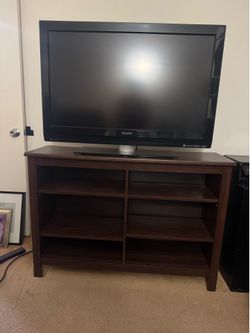 BROWN WOOD TV CONSOLE
