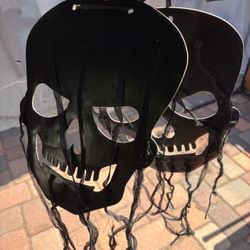 Halloween New 2 large black skull decorations $1 each