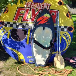 Towable tube W/ Rope, Wakeboard, Paddles and a Vest. 
