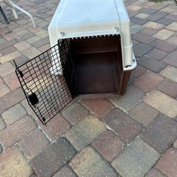 Cage For Dogs Or Cats 21 Inches Wide,22 Inches High And 28 Inches Long.