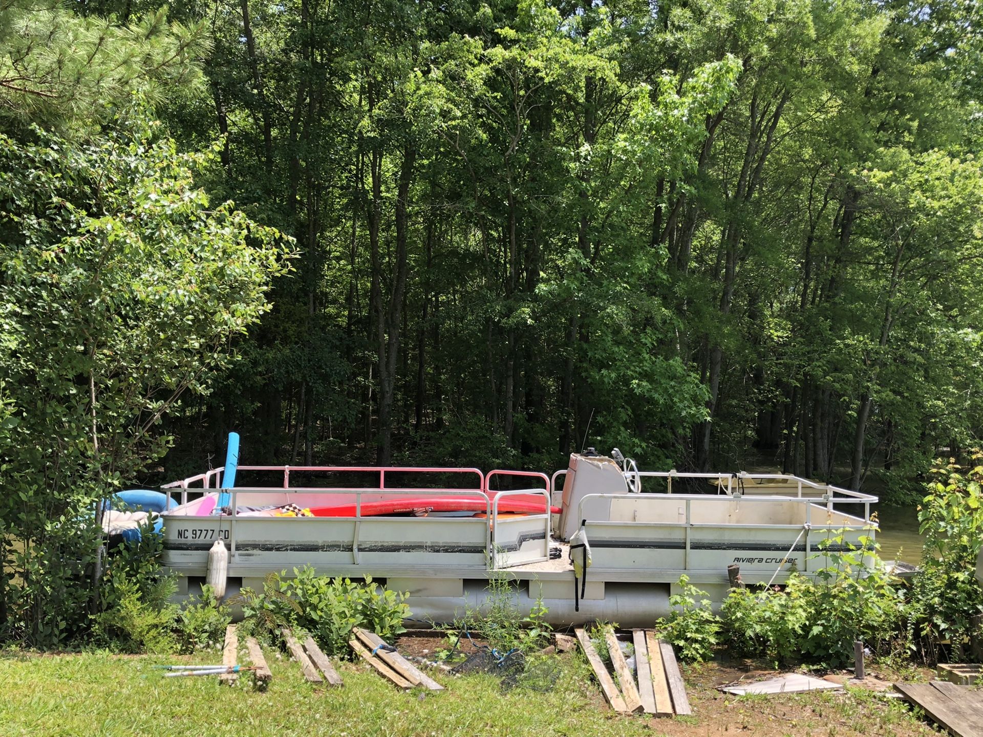 28 foot pontoon-no seats, no motor, as-is.