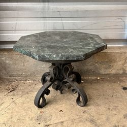 Victorian cast iron bistro table with a marble top. 