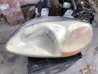 96-98 Honda Civic left headlight. Genuine Honda