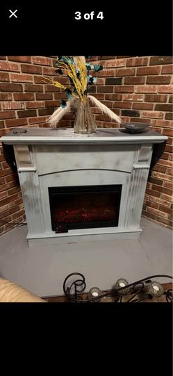 Electric fireplace with heater