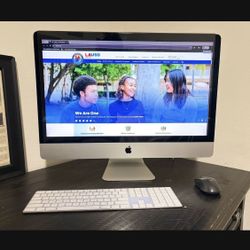 Mac Desktop 27”,  Apple keyboard, and mouse.