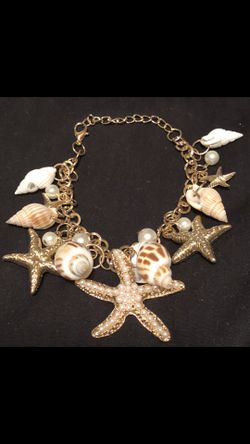 Women’s 14 kt gold plated Sea she’ll starfish bracelet 7/1/2!onch no refunds