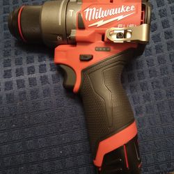 Brand New Milwaukee 12 Volt Hammer Drill With A 1.5 Battery