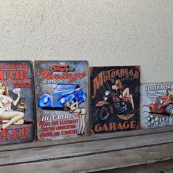 metal signs 18"×13" excellent condition $10 each 