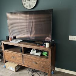 65 Inches Curved Screen Tv And Tv Stand Going For Sale