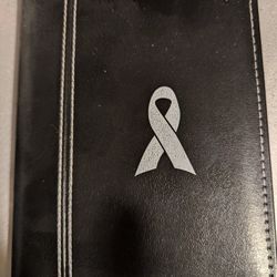 Photo Album Book, Breast Cancer Logo, Very Soft Black Leather, White Stitching, 12 Double Side Pockets Will Hold 24 Picutures 4x6, 6 1/2 H x 5 1/4 W,