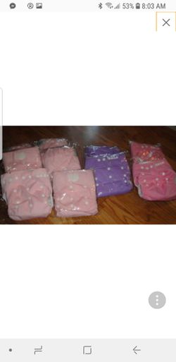 New cloth diapers w extra inserts