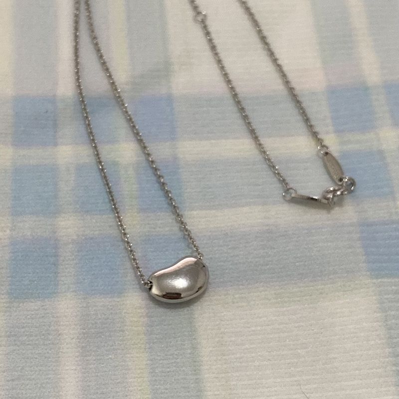 Tiffany & Co. A Smooth Round Bean Pendant Chain Is A Simple Thin Silver Chain. 