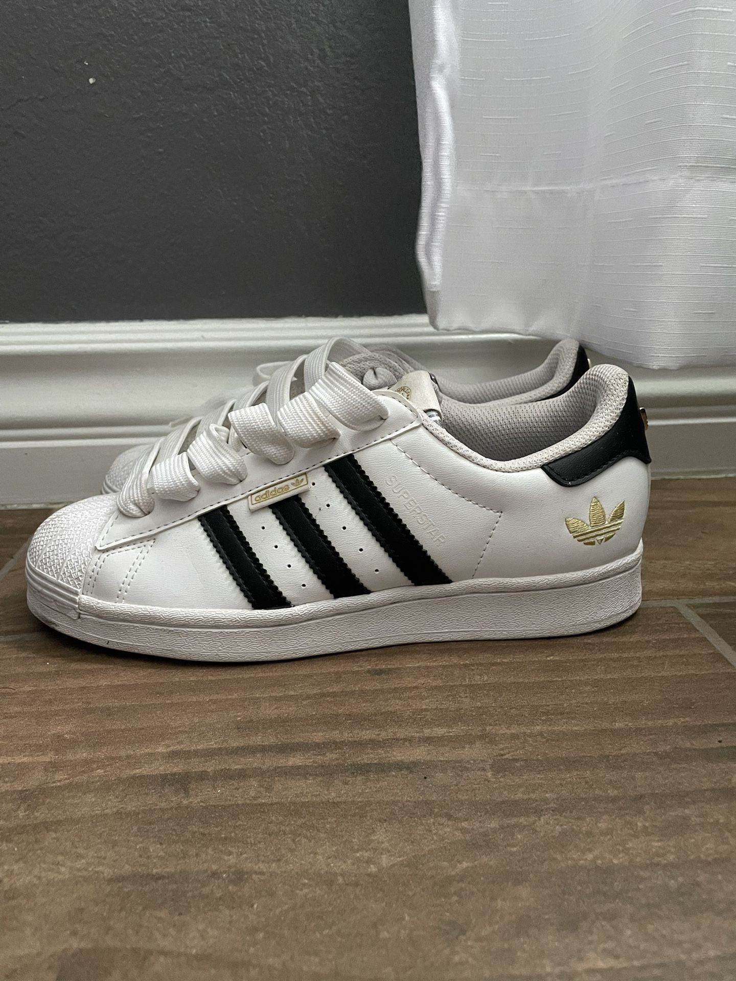White Adidas Super Stars