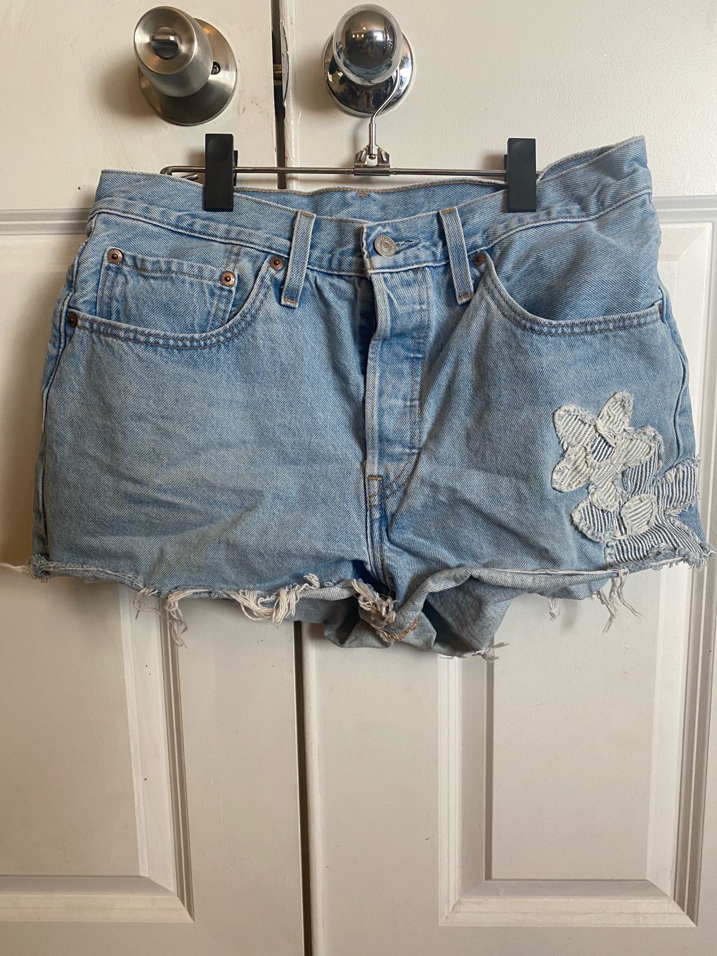 Levi’s 501 Light Blue Denim Frayed Hem Jean Shorts with Floral Patch