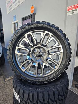 22" CHEVY rims w- 33" Tires