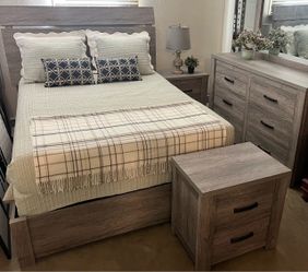 Queen size bedroom set. Excellent condition. Includes bedframe with comfortable mattress two nightstands and dresser with mirror.