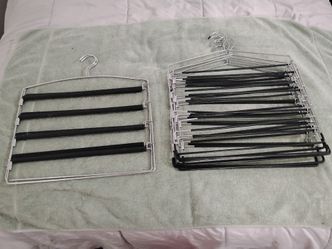 Set of Multi - Layer pants hangers for sale.