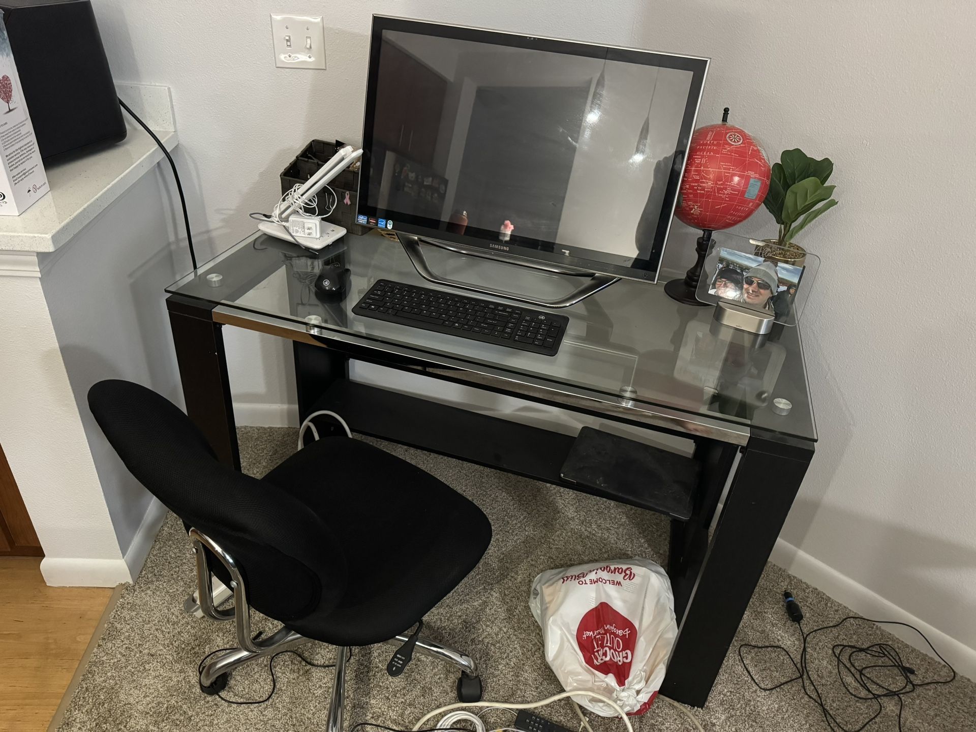 Black Desk With Glass Top And Roller Chair
