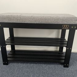 Shoe storage bench with cushioned seat