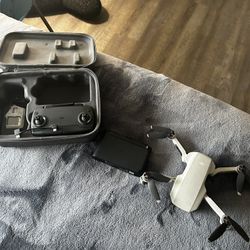 DJI Mavik Mini Drone $450 OBO With Extra Fins $600 Camera Remote Connects To Phone Extra Memory Card And 3 Extra Batteries Brand New.