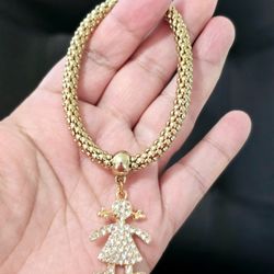 Pulseras de niña laminado en oro 14k.