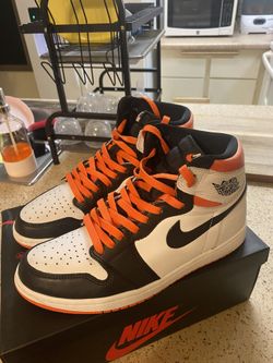 Electro orange Jordan 1s