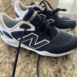 New Balance Metal Cleats Size 8