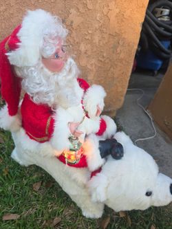 Santa Claus Riding Polar Bear Christmas Decoration