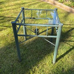 Outdoor metal and glass table